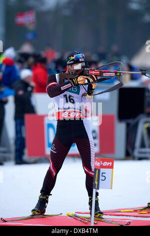 Oslo, Norvegia. Il 22 marzo 2014. E.sulla Coppa del Mondo di Biathlon 2014David Komatz dell'Austria compete in uomini 12,5 km inseguimento durante la Coppa del Mondo di Biathlon a Holmenkollen a Oslo, Norvegia. Credit: Azione Plus immagini di sport/Alamy Live News Foto Stock