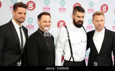 Londra, UK, 23 marzo 2014 Keith Duffy, Mikey Graham, Shane Lynch e Ronan Keating Boyzone di frequentare il Tesco mamma dell'anno premi al Savoy Hotel Credito: MRP/Alamy Live News Foto Stock