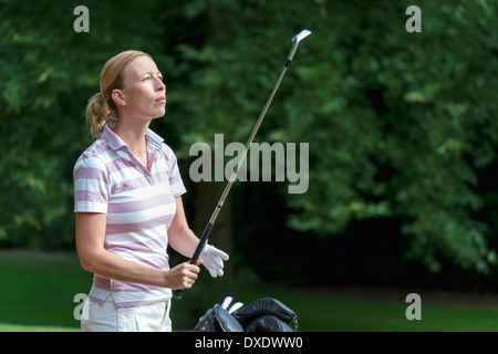 Donna sul campo da golf Foto Stock