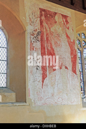 Un ha rivelato la pittura murale di San Cristoforo sulla parete nord della chiesa di St Mary a Moulton, Norfolk, Inghilterra, Regno Unito. Foto Stock