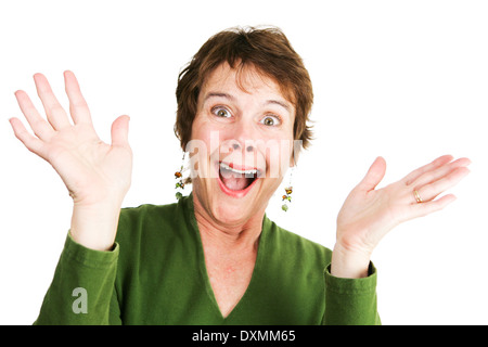 Foto divertente di una donna matura entusiasti e pieni di gioia. Isolato su bianco. Foto Stock