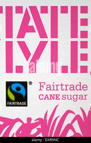 Fairtrade zucchero di canna - informazioni sul pacchetto di Tate and Lyle zucchero di canna Fairtrade - simbolo del logo del commercio equo e solidale Foto Stock