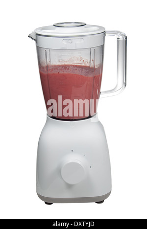 Preparazione di un congelati frullato fragole in un frullatore Foto Stock