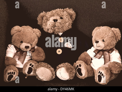 Collezione di peluche di orsetti di peluche seduto in poltrona. Foto Stock