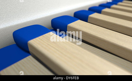 Una vista macro di un libro aperto di fiammiferi di legno con punte blu Foto Stock