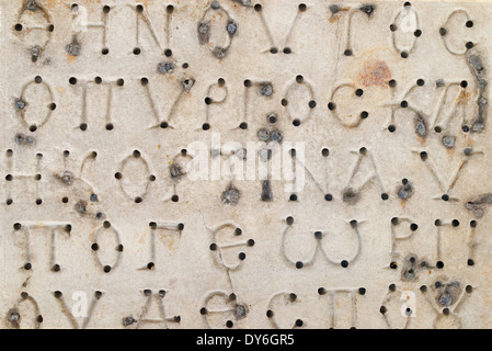Gli sfondi e texture: iscrizioni in greco su una lastra di marmo, testo abstract Foto Stock