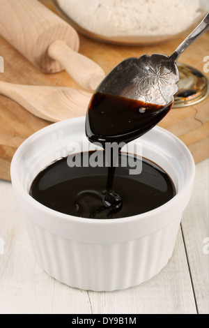Melassa nera o melassa blackstrap Foto Stock
