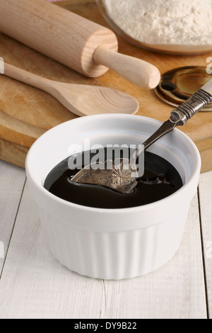 Melassa nera o melassa blackstrap Foto Stock