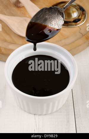 Melassa nera o melassa blackstrap Foto Stock