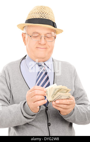 Titolare di pensione o di rendita maschio conteggiare denaro Foto Stock