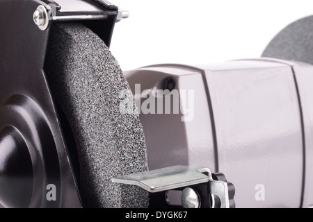 Primo piano della smerigliatrice da banco ruota isolati su sfondo bianco Foto Stock
