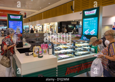 Sydney Australia,Aeroporto Kingsford-Smith,SYD,terminal,gate,Krispy Kreme,ciambelle,ciambelle,sportello,clienti,AU140307041 Foto Stock