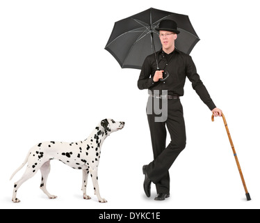 Junger Mann mit Melone, Regenschirm und Gehstock, giovane con cappello bowler, ombrello e bastone, Mann mit Dalmatiner; Sc Foto Stock