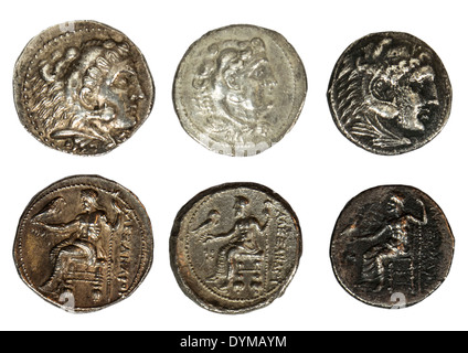Alessandro Magno Silver Tetradrachm monete 336-323 BC con testa di Eracle in pelle di leone e seduto Zeus. Su sfondo bianco Foto Stock