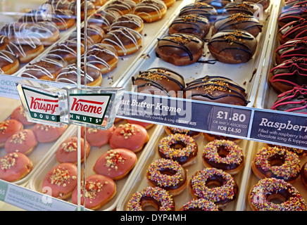 Ciambelle Krispy Kreme sul display Foto Stock