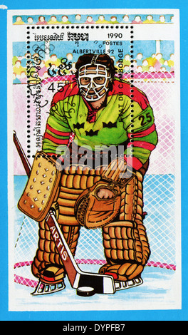 Cambogia - circa 1990: un timbro stampato in Cambogia, mostra il hockey goalie, circa 1990 Foto Stock