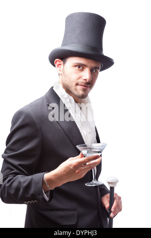 Imprenditore con Top Hat e bastone in una suite Foto Stock