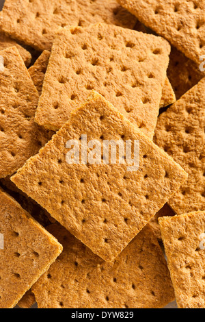 Miele di sani Graham cracker su una piastra Foto Stock