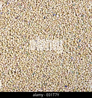 Texture di giallo e rosa secca semi di fieno greco Foto Stock