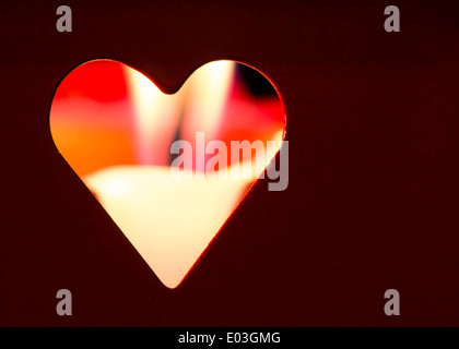 Candele e cuore rosso forme. Foto Stock