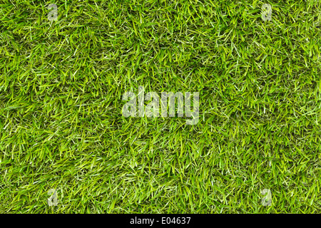 Tagliare plastica verde erba cantiere Texture di sfondo. Foto Stock