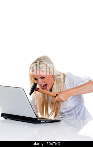 Donna con computer a del problema, il martello e il laptop:, Frau mit Computer Problemen, martello und laptop: Foto Stock