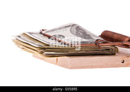 Un sacco di dollaro di banconote in un mousetrap. Debiti e bilancio, Viele Dollar Geldscheine in einer Mausefalle. Schulden und Budge Foto Stock