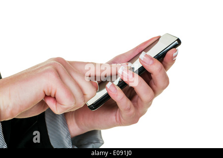 Una donna che scrive un SMS su un cellulare. La comunicazione rapida tramite il telefono cellulare., Eine Frau schreibt auf einem Handy eine SMS. Schn Foto Stock