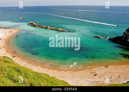 Man o War caletta adiacente alla porta di Durdle su Jurassic Coast in Dorset costituisce parte di una unica sezione di costa. Foto Stock