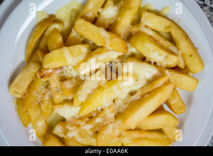 Scaglie di formaggio formaggio o patatine fritte. Foto Stock