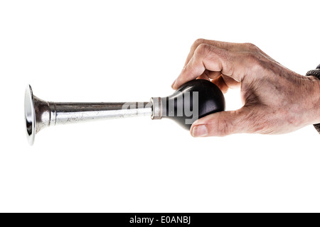 Un vecchio manuale tromba d'aria isolate su uno sfondo bianco Foto Stock