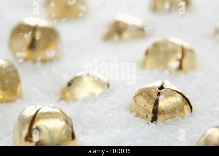 Golden Jingle Bells nella neve Foto Stock