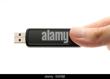 Mano azienda USB flash su bianco Foto Stock