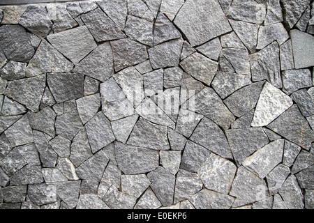 La texture del muro di pietra sullo sfondo Foto Stock