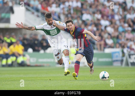 Elche, Spagna. 11 Maggio, 2014. Leo Messi ans Javi Marquez nel match tra Elche e FC Barcelona, per settimana 37 del Liga spagnola BBVA ha suonato presso la Martinez Valero Stadium, 11 maggio 2014. Foto: Aitor Bouzo/Urbanandsport/Nurphoto. © Aitor Bouzo/NurPhoto/ZUMAPRESS.com/Alamy Live News Foto Stock