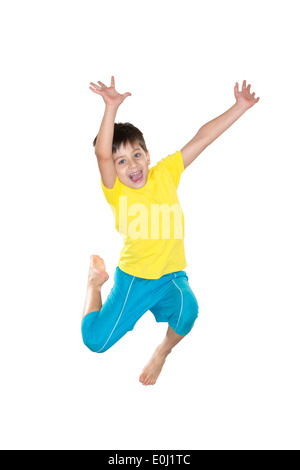 Ragazzo brasiliano, saltando, giallo e blu Foto Stock