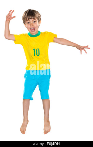 Ragazzo brasiliano, saltando, giallo e blu Foto Stock