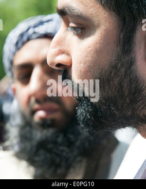 Moslem men debating at Speakers Corner, Hyde Park, London Foto Stock