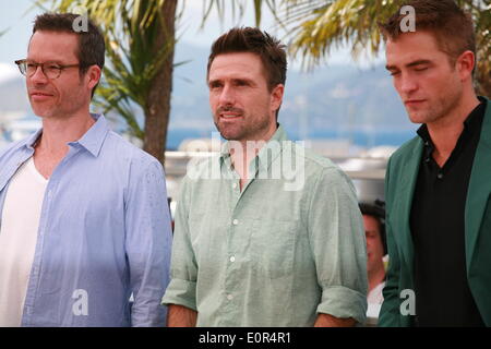 Cannes, Francia. Il 18 maggio 2014. Guy Pearce, Direttore David Michod e Robert Pattinson presso la foto chiamata per il film il Rover al 67th Cannes Film Festival, domenica 18 maggio 2014, Cannes, Francia. Credito: Doreen Kennedy/Alamy Live News Foto Stock