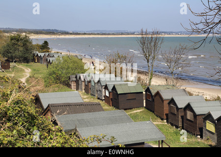 Cabine sulla spiaggia, a studland su la costa del Dorset Foto Stock