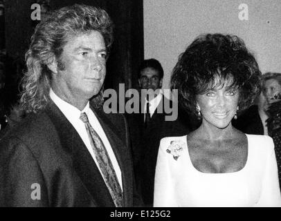 Attrice Elizabeth Taylor a beneficio con Larry Fortensky Foto Stock