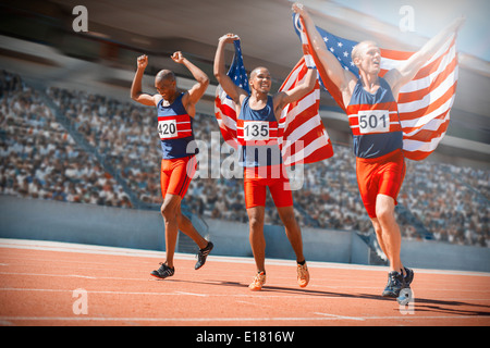 Gli atleti americani celebrando in via Foto Stock