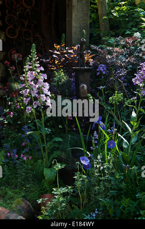 Una pompa di acqua nel DialAFlight Potter's Garden al RHS Chelsea Flower Show 2014 Foto Stock