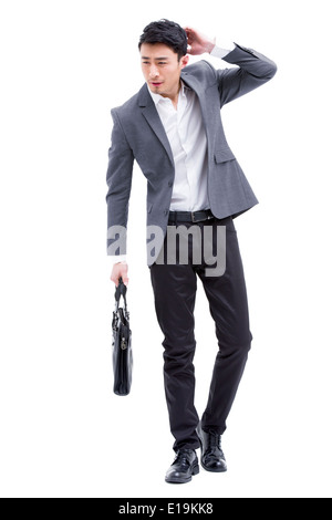 Moda uomo d affari di graffiare la testa Foto Stock