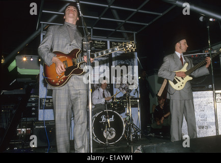 Soffiare le scimmie UK del gruppo rock circa 1987. Da sinistra: Robert Howard, Tony Kiley, Mick Anker Foto Stock