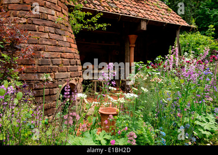 Il DialAFlight Potter's Garden, un artigiano giardino medaglia d'oro al Chelsea Flower Show 2014, London, Regno Unito Foto Stock