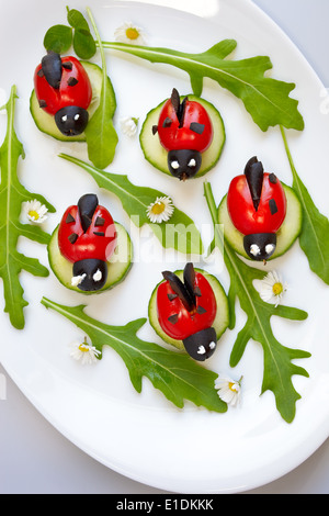 Pomodoro antipasto coccinella Foto stock Alamy