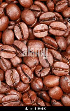 I chicchi di caffè con copia spazio formante uno sfondo Foto Stock