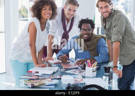 I progettisti di sorridere alla telecamera Foto Stock