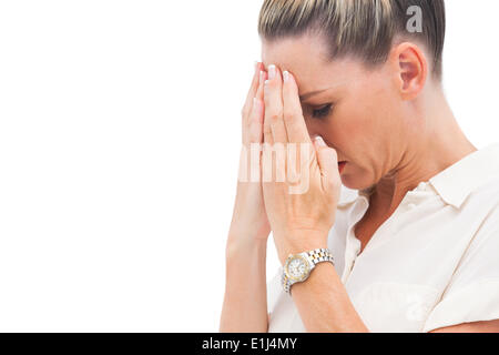 Paura imprenditrice con le mani sulla testa Foto Stock